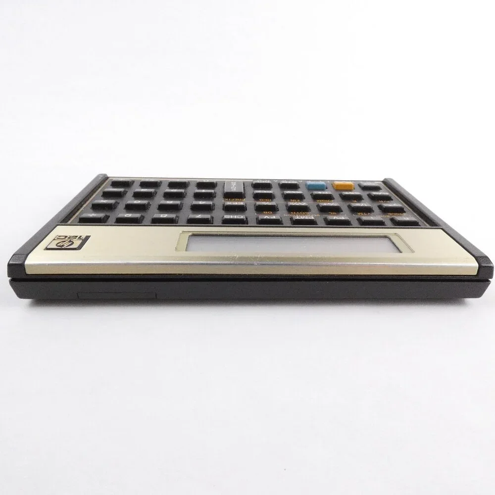 HP 12C Financial Calculator 10-Digit LCD With Case and Batteries Gold Faceplate